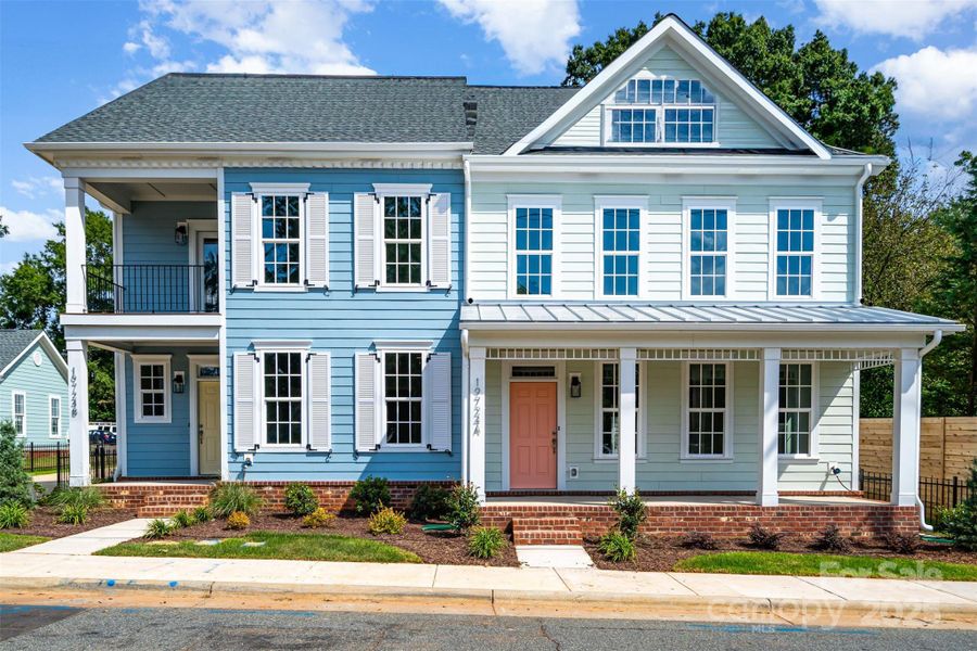 Front exterior of a new home in , Cornelius, NC, highlighting curb appeal (Image 1).
