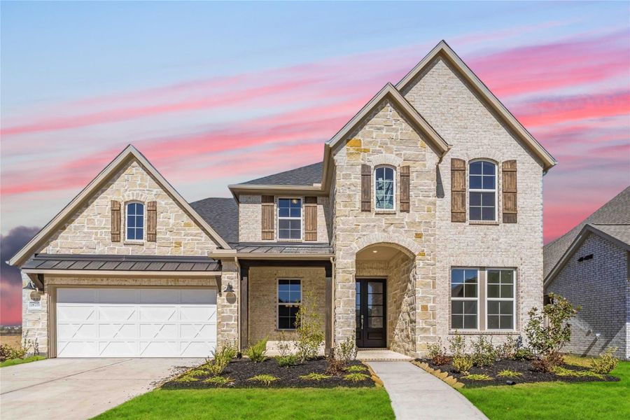Front exterior of a new home in Valencia, Manvel, TX, highlighting curb appeal (Image 1). Front exterior of a new home in Valencia, Manvel, TX, highlighting curb appeal (Image 1).