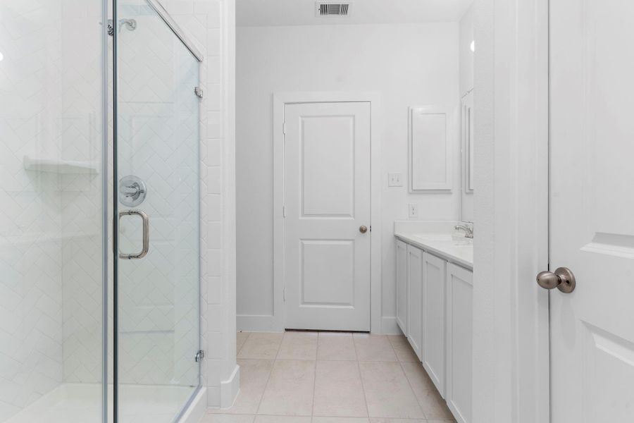 This private enclosed water closet offers convenience and discretion, complete with a full vanity area, medicine cabinet, and sleek modern finishes. It’s the little touches that make a big difference. This private enclosed water closet offers convenience and discretion, complete with a full vanity area, medicine cabinet, and sleek modern finishes. It’s the little touches that make a big difference.