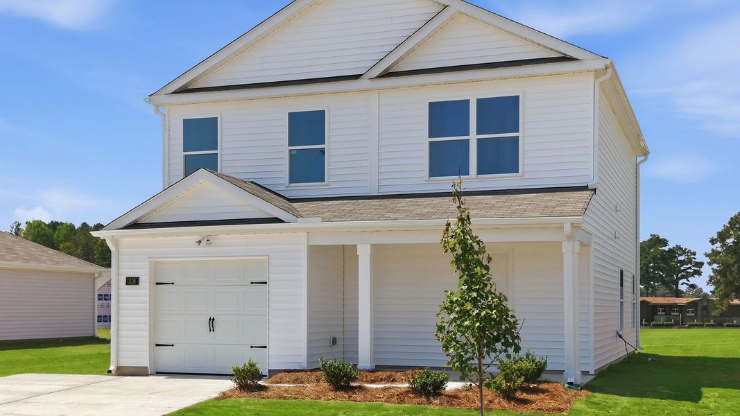Front exterior of a new home in Hobbs Farm, Ayden, NC, highlighting curb appeal (Image 19). Front exterior of a new home in Hobbs Farm, Ayden, NC, highlighting curb appeal (Image 19).