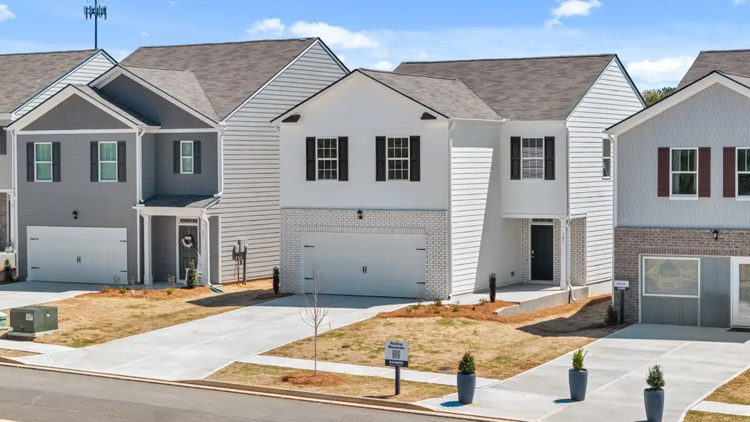 Representative exterior photo of a completed home built from the Aisle by D.R. Horton in Rolling Meadows, Jasper, GA (Image 1).
