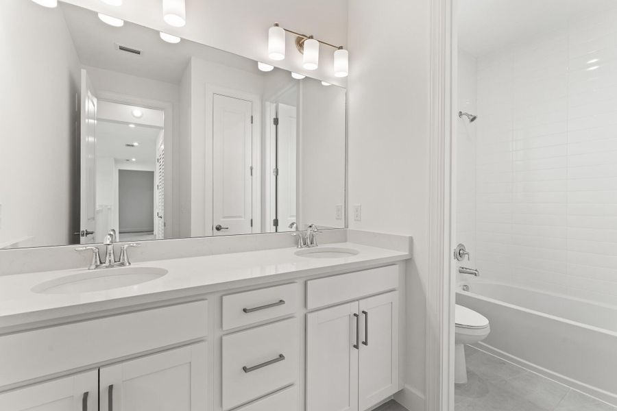 Furnished interior view inside a new home in Tradition - Seville, Port St. Lucie (Image 6).