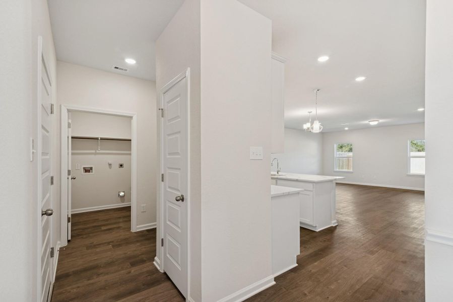 The Crawford- Hall to Utility Room. Home under construction, photo used for illustrative purposes only, colors and options will vary.