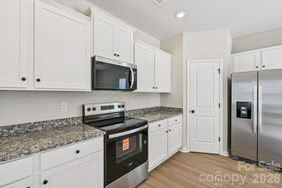 Furnished interior view inside a new home in Willow Estates, Shelby (Image 7).