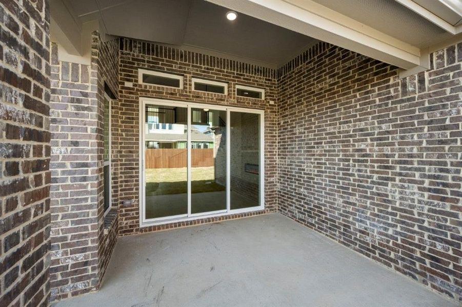 Exterior details and patio area of a home in Westside Preserve, Midlothian (Image 3).