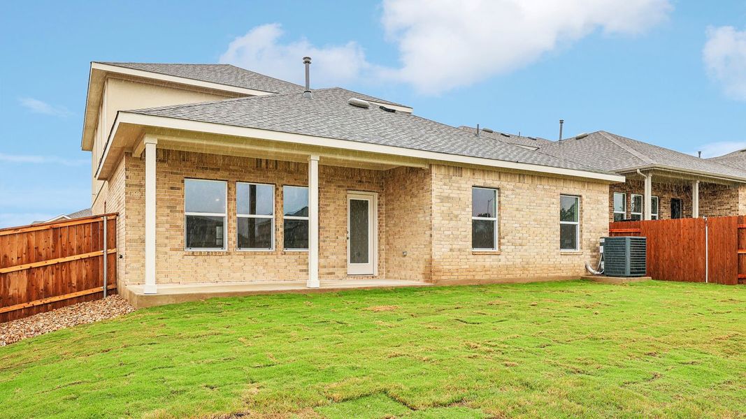 Exterior details and patio area of a home in Bar W Ranch, Leander (Image 21).