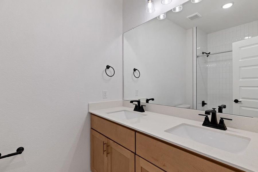 Furnished interior view inside a new home in Heritage, Dripping Springs (Image 15).