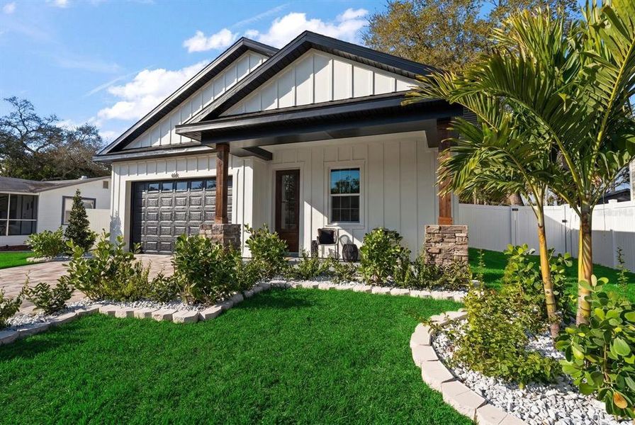 Front exterior of a new home in , Dunedin, FL, highlighting curb appeal (Image 22).