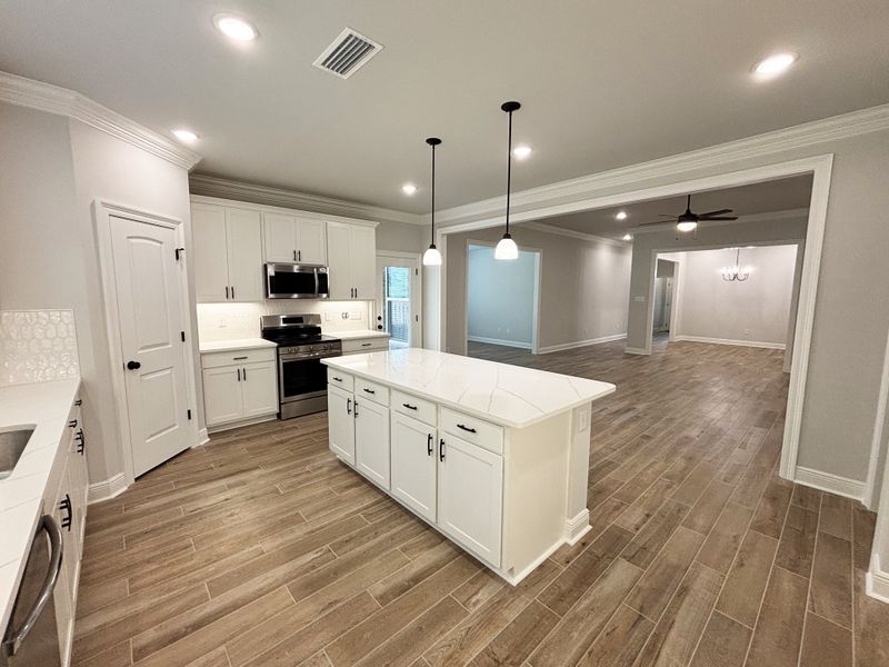 Furnished interior view inside a new home in Bird Song at Hammock Bay, Freeport (Image 7).