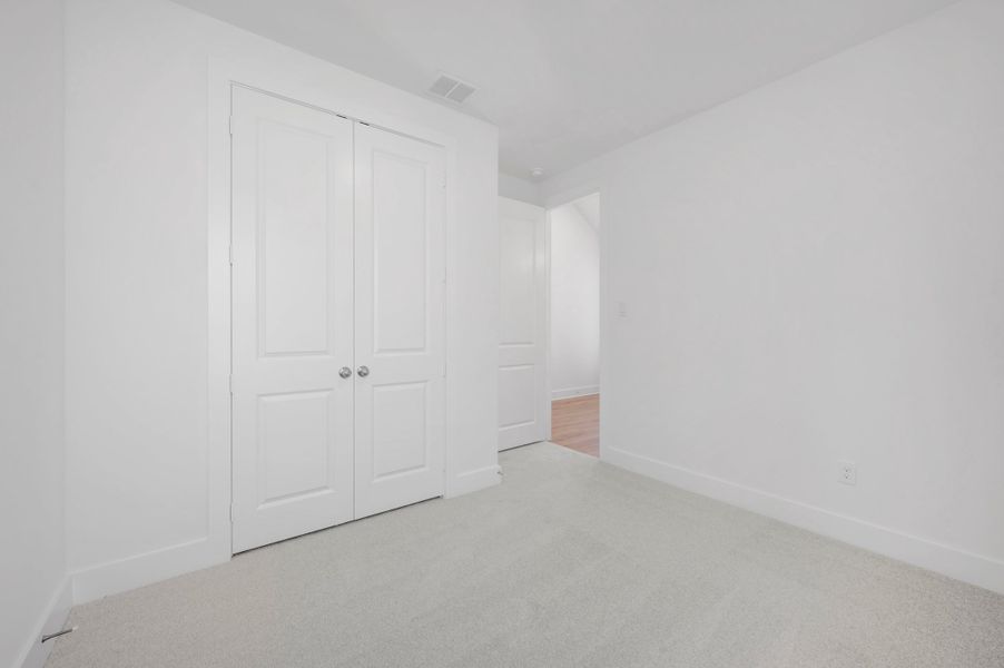 Spacious, unfurnished interior of a new home in The Meadows, Denton (Image 25).