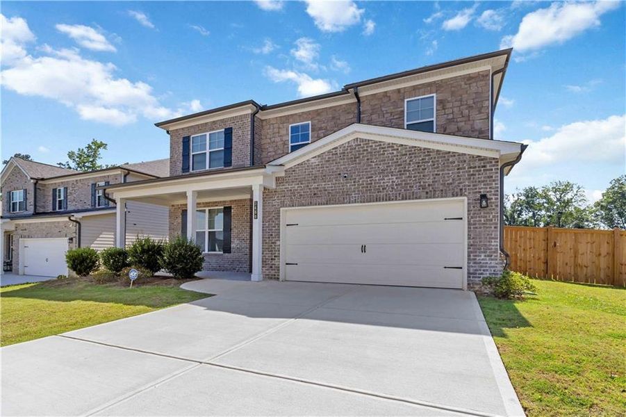 Front exterior of a new home in , Atlanta, GA, highlighting curb appeal (Image 29).