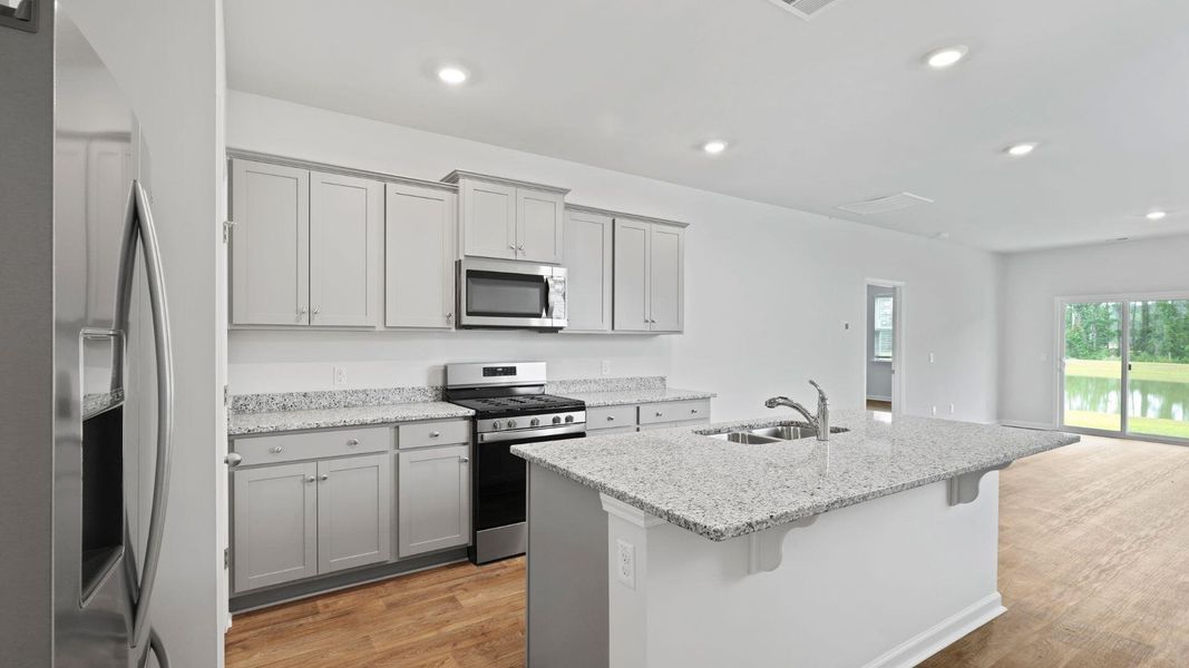 Furnished interior view inside a new home in Pine Hills at Cane Bay, Summerville (Image 2). Furnished interior view inside a new home in Pine Hills at Cane Bay, Summerville (Image 2).