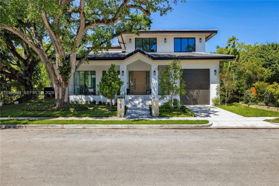 Front exterior of a new home in , Miami, FL, highlighting curb appeal (Image 2).