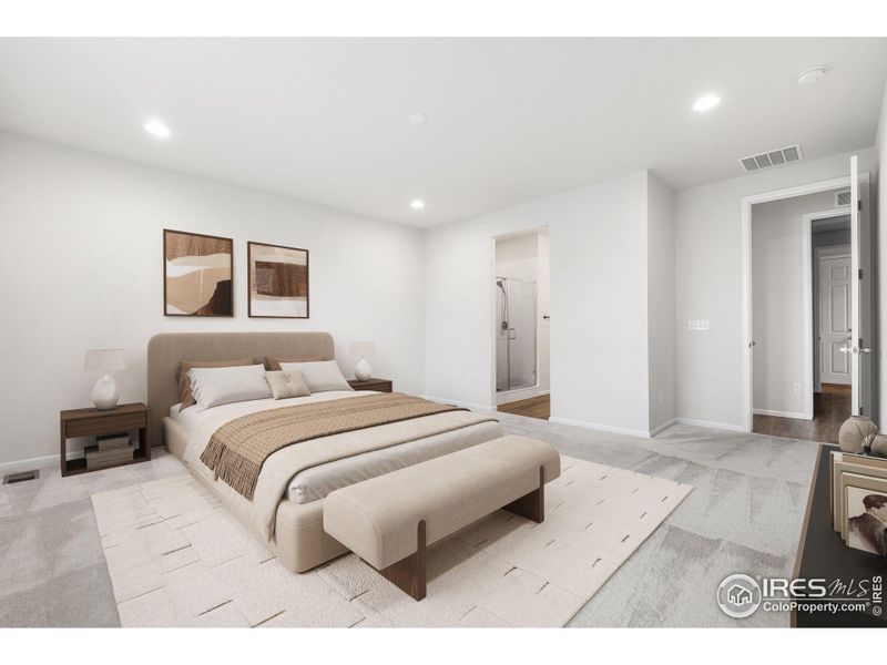 Main Level spacious primary bedroom with a connected ensuite primary bathroom. This photo has been virtually staged to provide visual ideas for how furniture can be arranged in this area of the home.