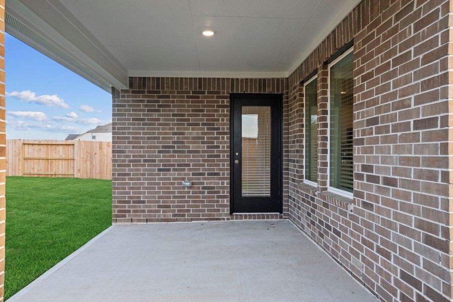 Exterior details and patio area of a home in Westland Ranch 50' Homesites, League City (Image 2).