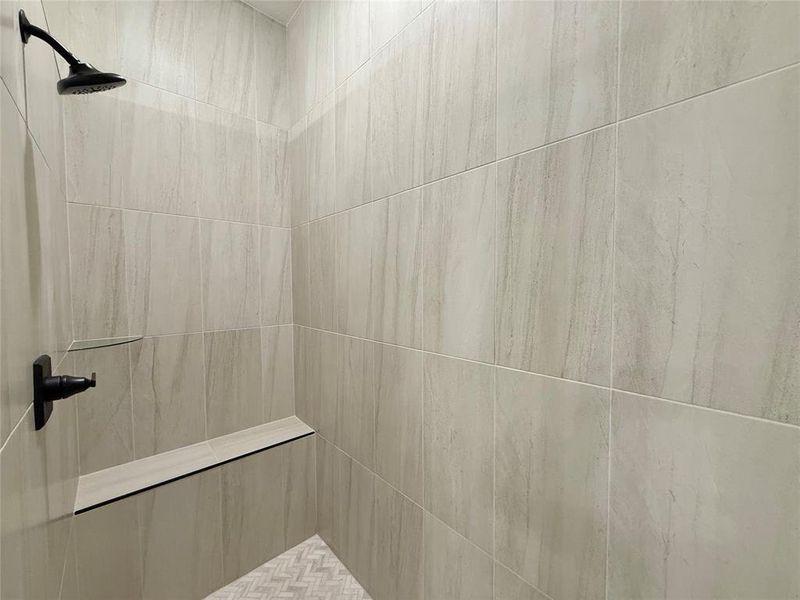 Bathroom view of tiled shower