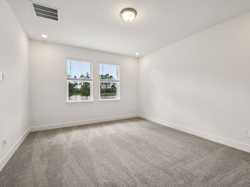 Spacious, unfurnished interior of a new home in Legends Preserve - Signature Series, Daytona Beach (Image 10).