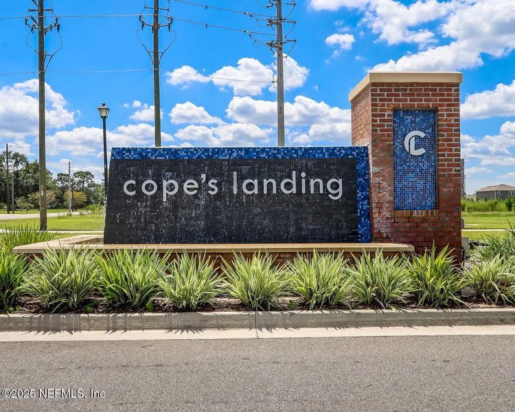 Front exterior of a new home in Copes Landing, Jacksonville, FL, highlighting curb appeal (Image 20).