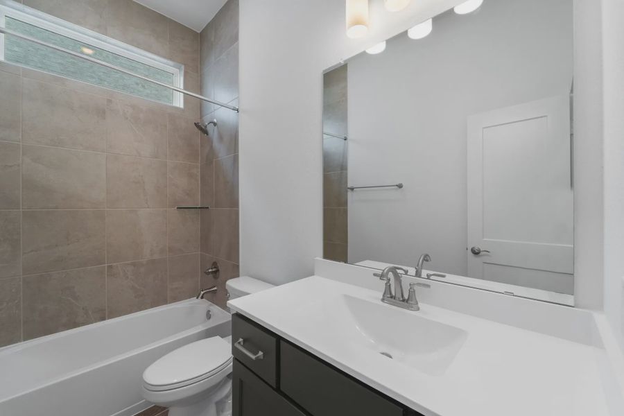 Image 55 representing the Augusta by Chesmar Homes in Riceland Alley Loads, Mont Belvieu, TX.