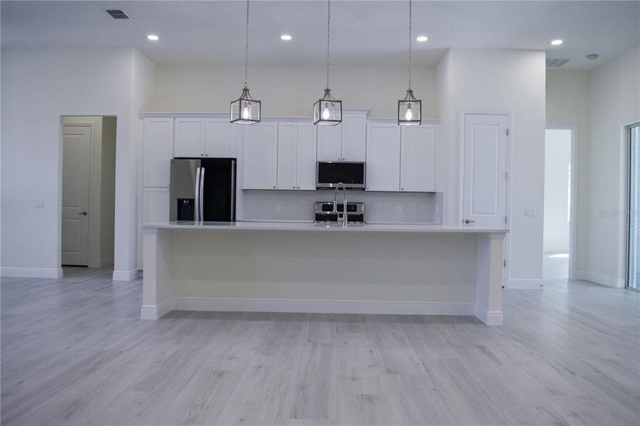 Furnished interior view inside a new home in , Lake Alfred (Image 4).