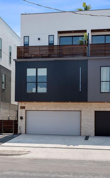 Contemporary house featuring brick siding Contemporary house featuring brick siding