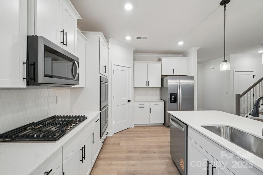 Furnished interior view inside a new home in Oak Grove Hill, Huntersville (Image 5).