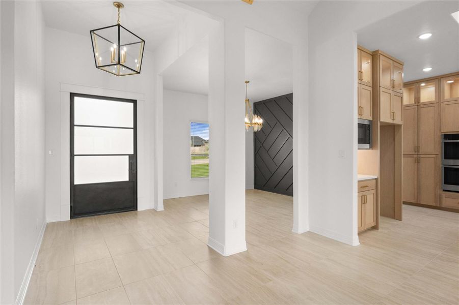 Clean lines and a modern aesthetic greet you upon entry. Clean lines and a modern aesthetic greet you upon entry.
