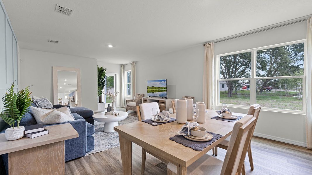 Representative furnished interior of a home built from the HARPER by D.R. Horton in Wynwood, Ocoee (Image 6).