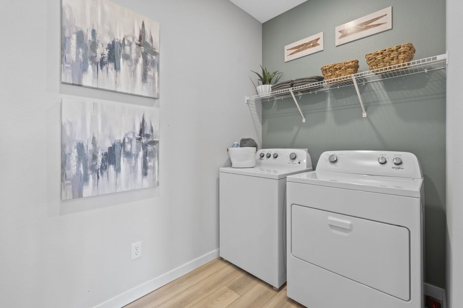 Coronado Model Home Laundry Room with Washer and Dryer at Reserve East in Flagler Beach