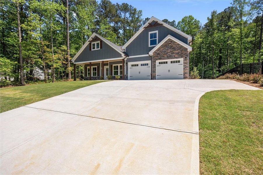 Front exterior of a new home in , Villa Rica, GA, highlighting curb appeal (Image 23).