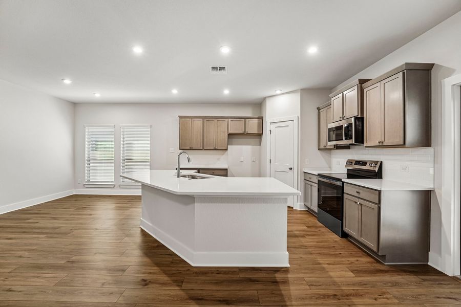 Representative furnished interior of a home built from the Morris by Omega Builders in Three Creeks, Belton (Image 5).