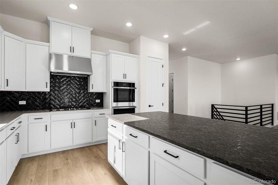 Furnished interior view inside a new home in Wolf Ranch - Enclave Collection, Colorado Springs (Image 15).
