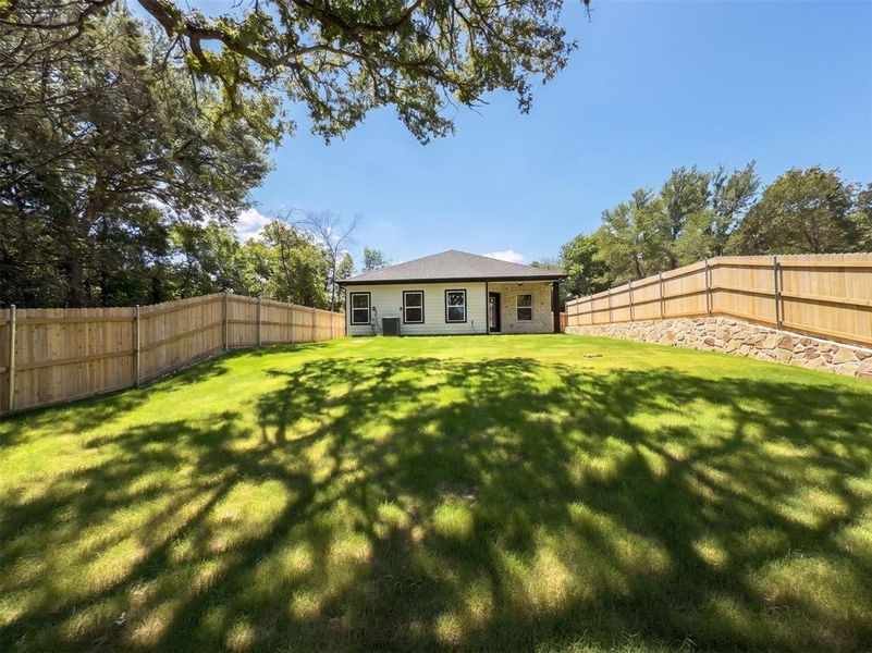 Exterior details and patio area of a home in , Granbury (Image 26). Exterior details and patio area of a home in , Granbury (Image 26).