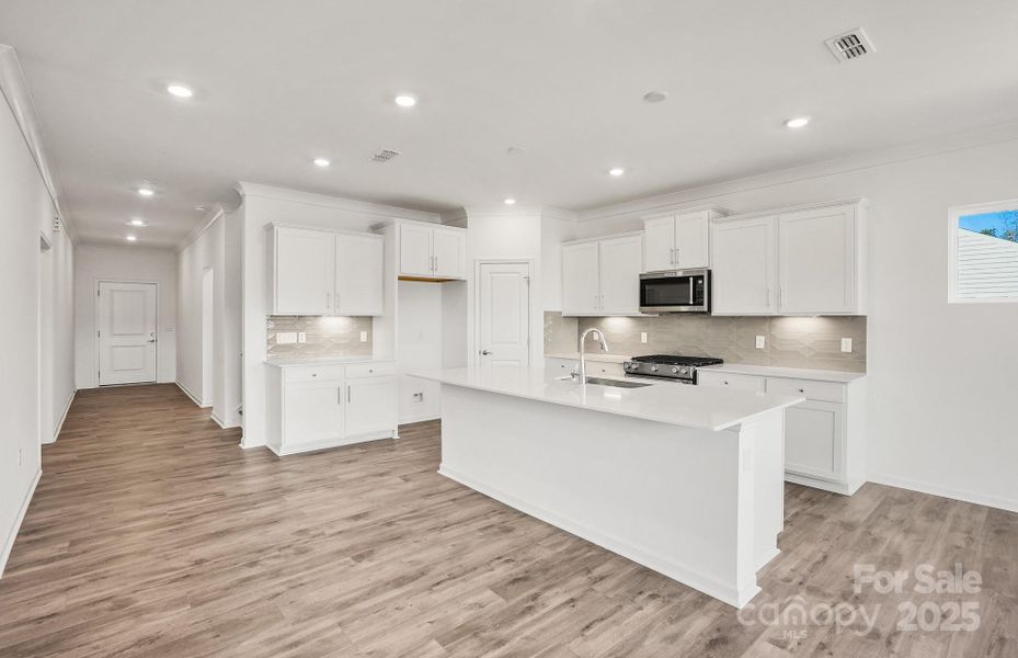 Furnished interior view inside a new home in Bryton, Huntersville (Image 5).