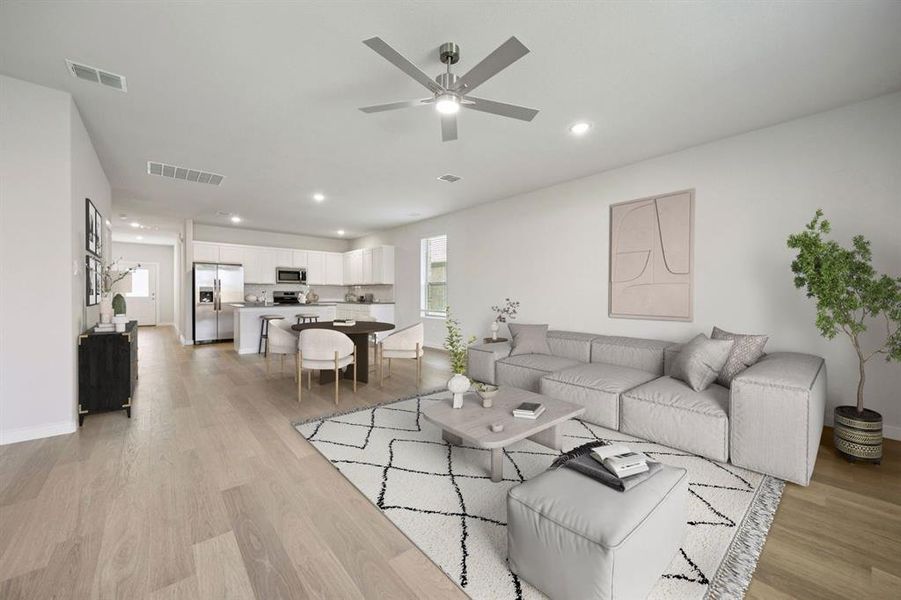 Living Room in the Haylee home plan by Trophy Signature Homes - REPRESENTATIVE PHOTO