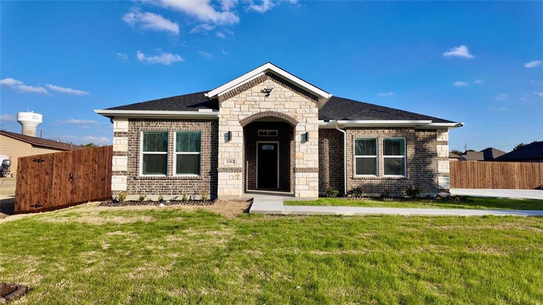 Front exterior of a new home in , Red Oak, TX, highlighting curb appeal (Image 25).