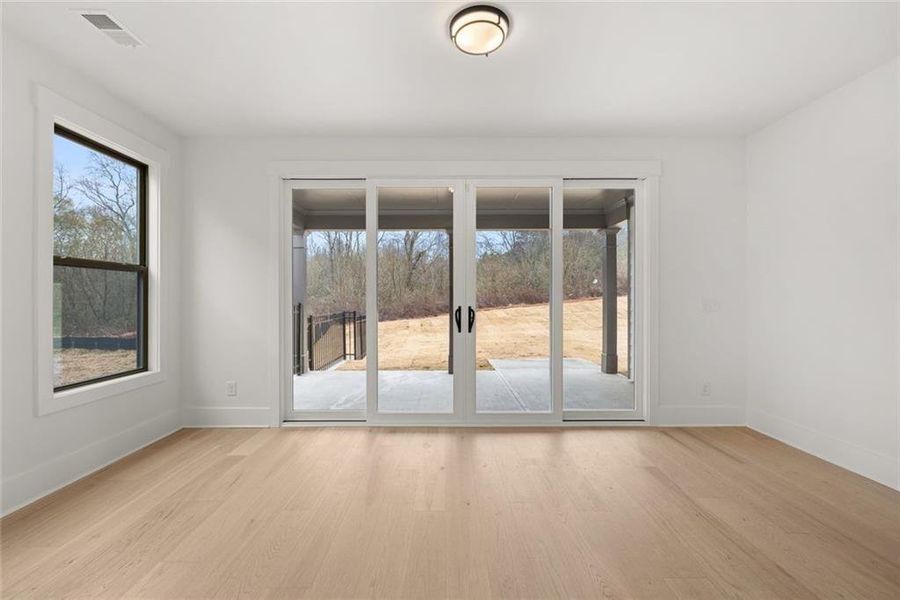 Spacious, unfurnished interior of a new home in Soleil Belmont Park, Canton (Image 51).