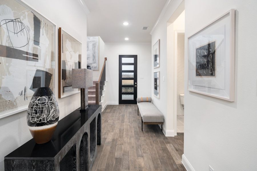 Representative furnished interior of a home built from the Kirby by UnionMain Homes in Lake Breeze, Lavon (Image 44).