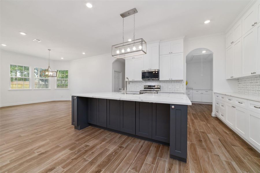 Thoughtfully designed with lots of cabinet space under the island. Thoughtfully designed with lots of cabinet space under the island.