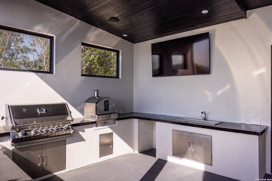 Exterior details and patio area of a home in , Kerrville (Image 46).