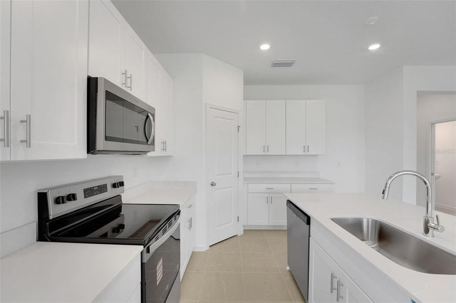 Furnished interior view inside a new home in Willowbrook North, Winter Haven (Image 6).