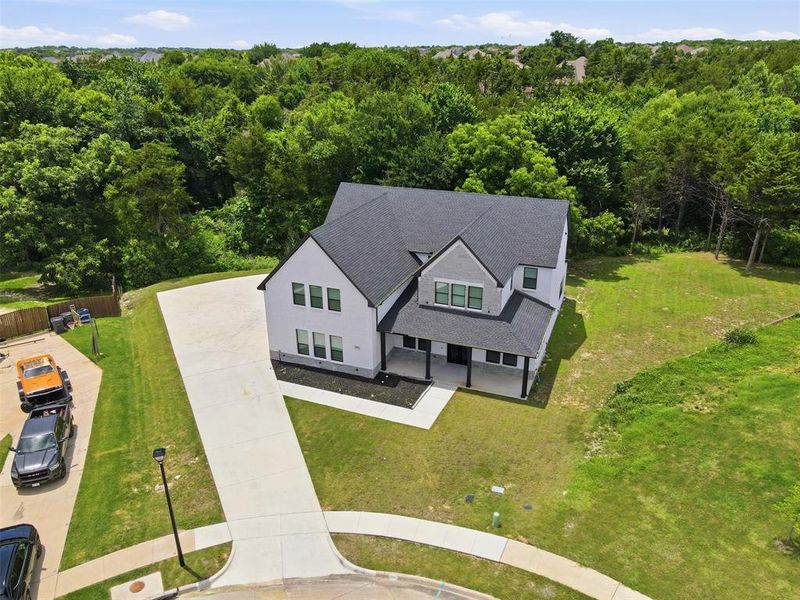 Front exterior of a new home in , Ovilla, TX, highlighting curb appeal (Image 28).