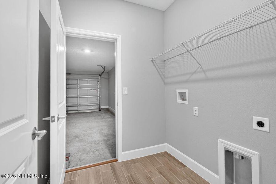 Spacious, unfurnished interior of a new home in Colbert Landings, Palm Coast (Image 24).