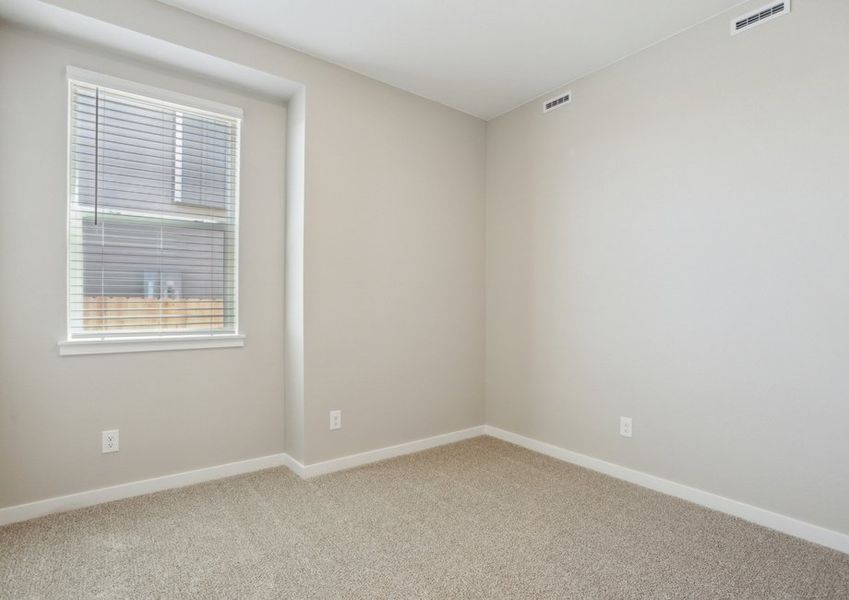 The secondary bedroom has carpet.