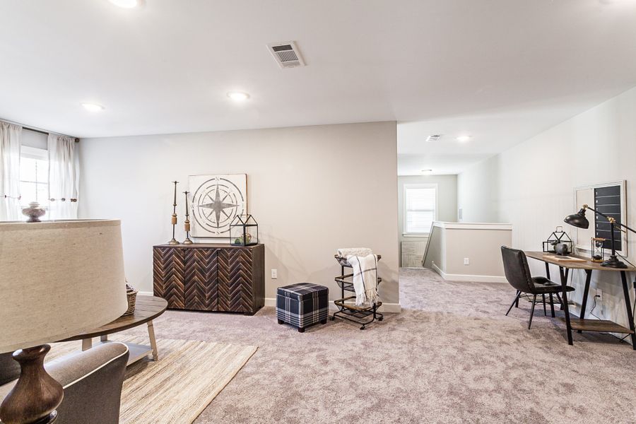 Representative furnished interior of a home built from the Bentley by Grant & Co in Manor at Hall Creek, Arlington (Image 14).