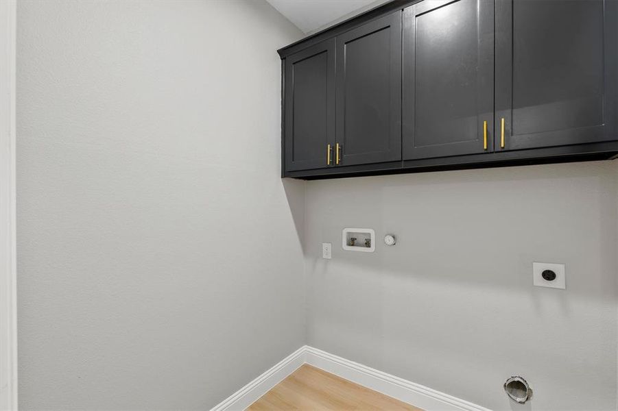 Utility room in the hallwaynext to garage entry