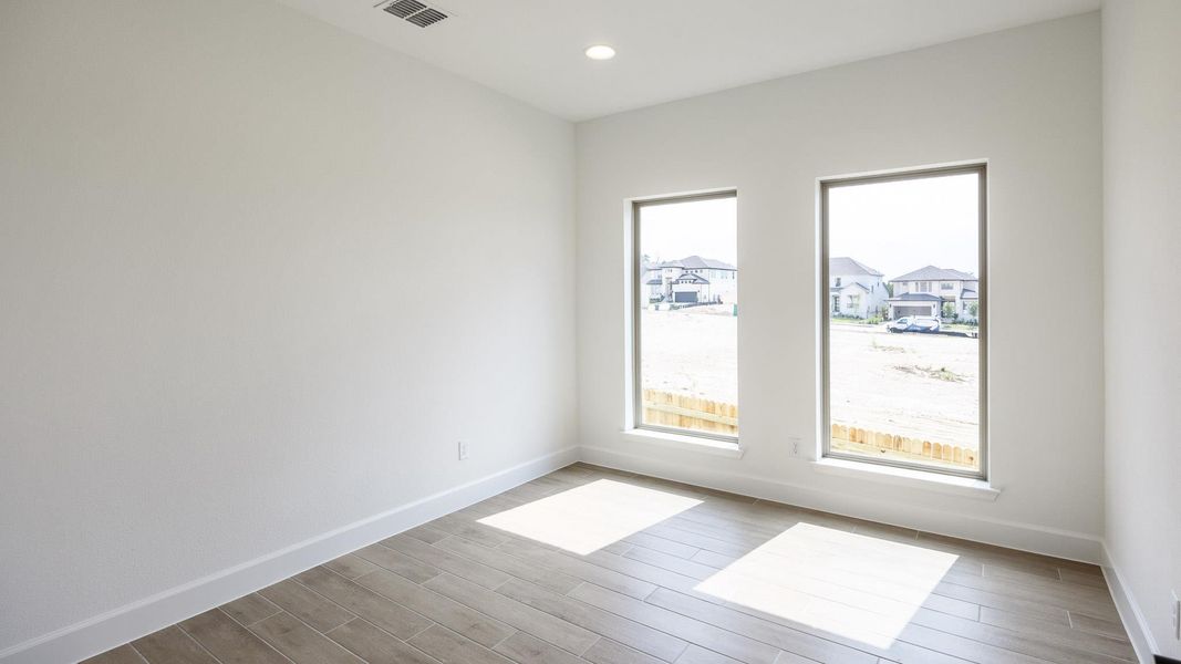 Spacious, unfurnished interior of a new home in Santa Rita Ranch - Eldorado, Liberty Hill (Image 12). Spacious, unfurnished interior of a new home in Santa Rita Ranch - Eldorado, Liberty Hill (Image 12).