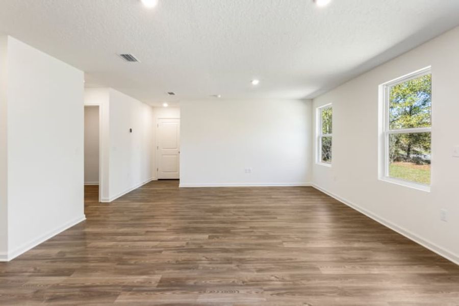 A room with white walls and a wood floor. A room with white walls and a wood floor.