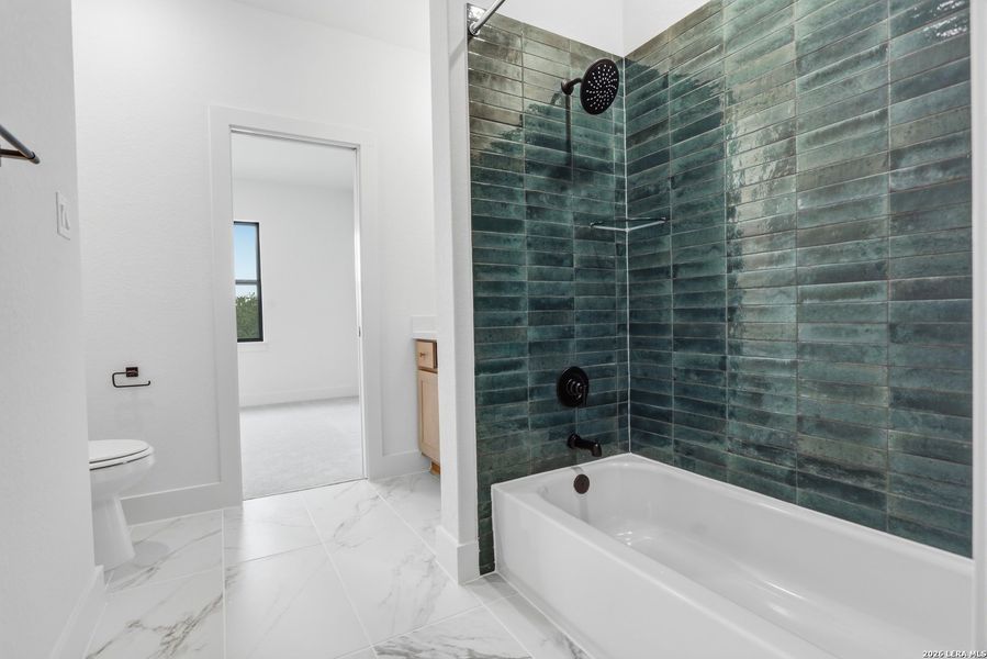 Furnished interior view inside a new home in Enchanted Bluff, San Antonio (Image 16).