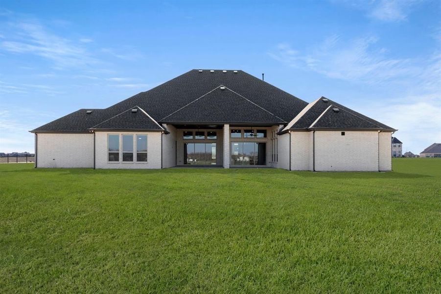 Exterior details and patio area of a home in Parker Ranch, Parker (Image 24).